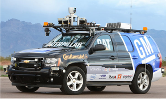 Combination of DSRC and Driverless Car to Improve Traffic Condition