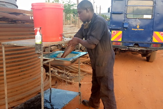 Foot operated hand washing machine.