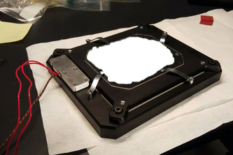 Precision temperature control microscope-mounting jig
